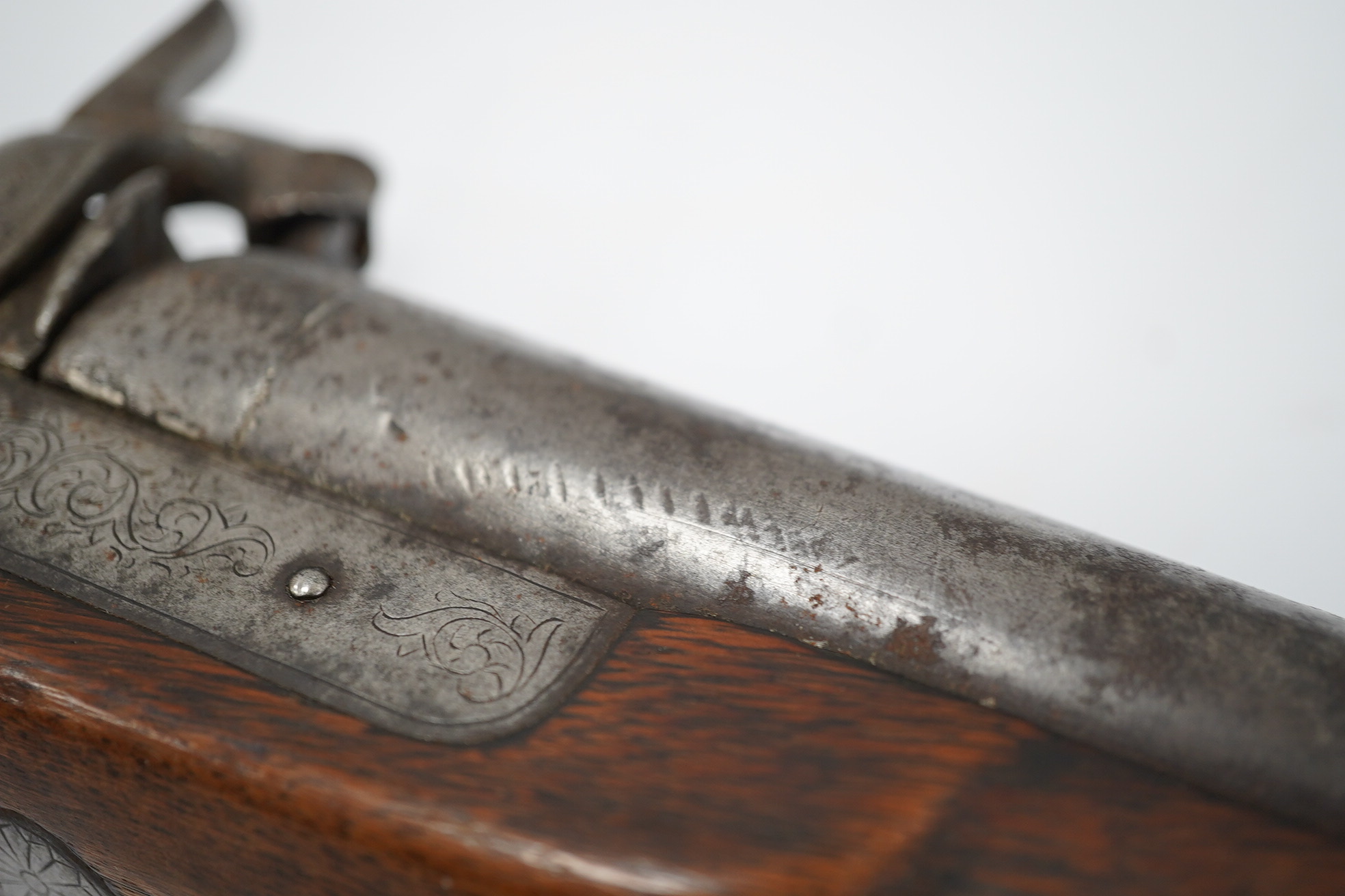 A Turkish flintlock Kubar pistol, with fully stocked brass mounts, polished steel lock and barrel (well worn), barrel 31cm, and a double barrel 12 bore percussion pistol cut down from a sporting gun, barrel 26.5cm, (2).